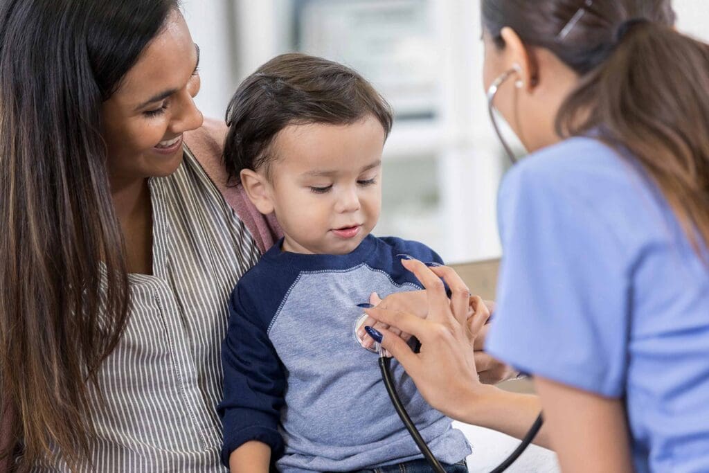 child getting checkup