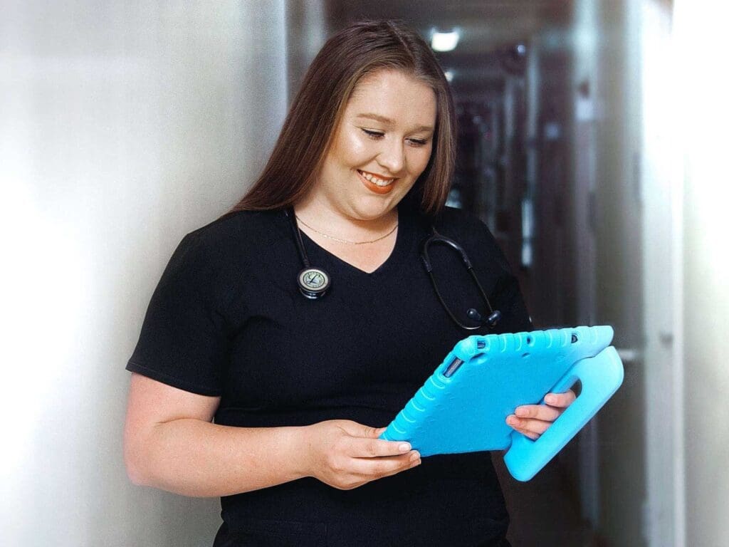 woman reading tablet device