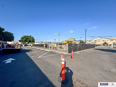 Construction crews survey the Lakeside location